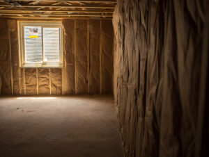 Fiberglass batt installation in a house
